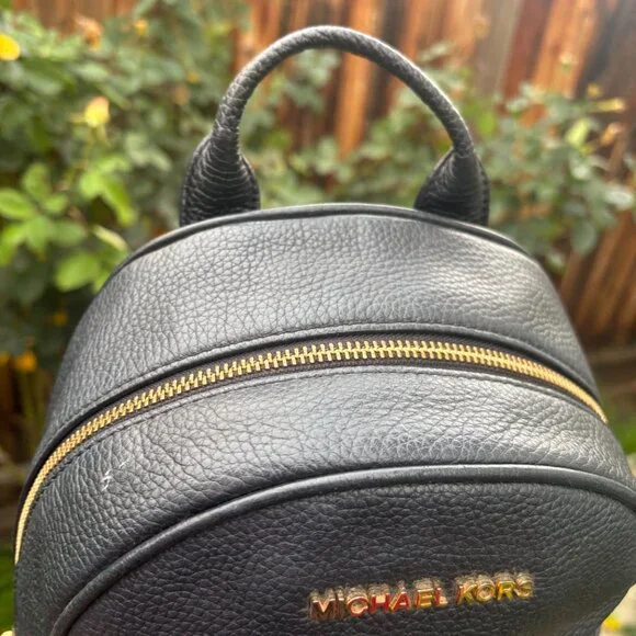 Authentic Michael kors black leather backpack purse